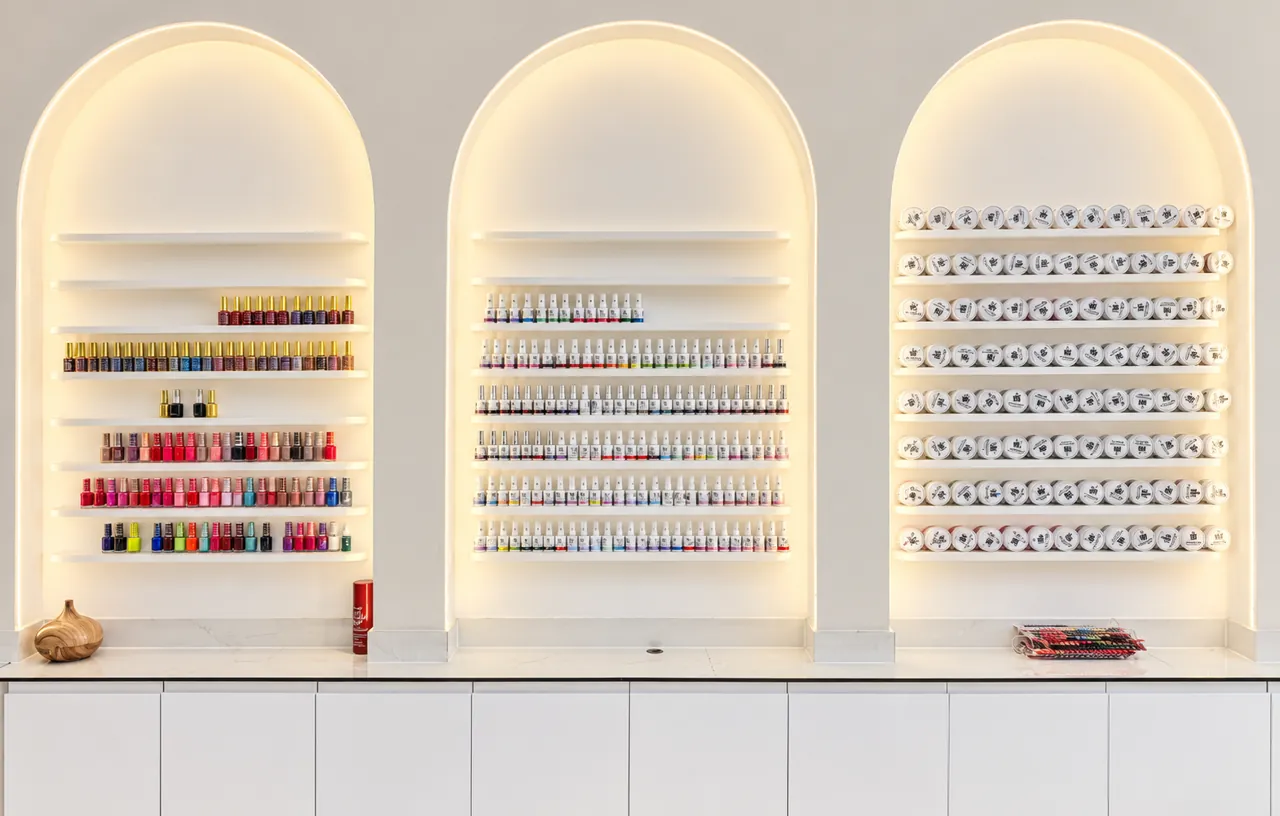 Lit arches full of nail polish colours at Chillux Nails, Orpington