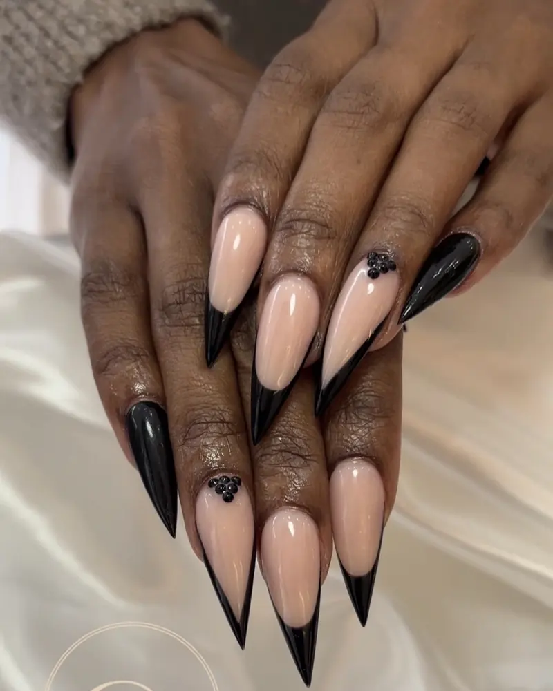 Black French stiletto nails with black gems at Chillux Nails, Orpington