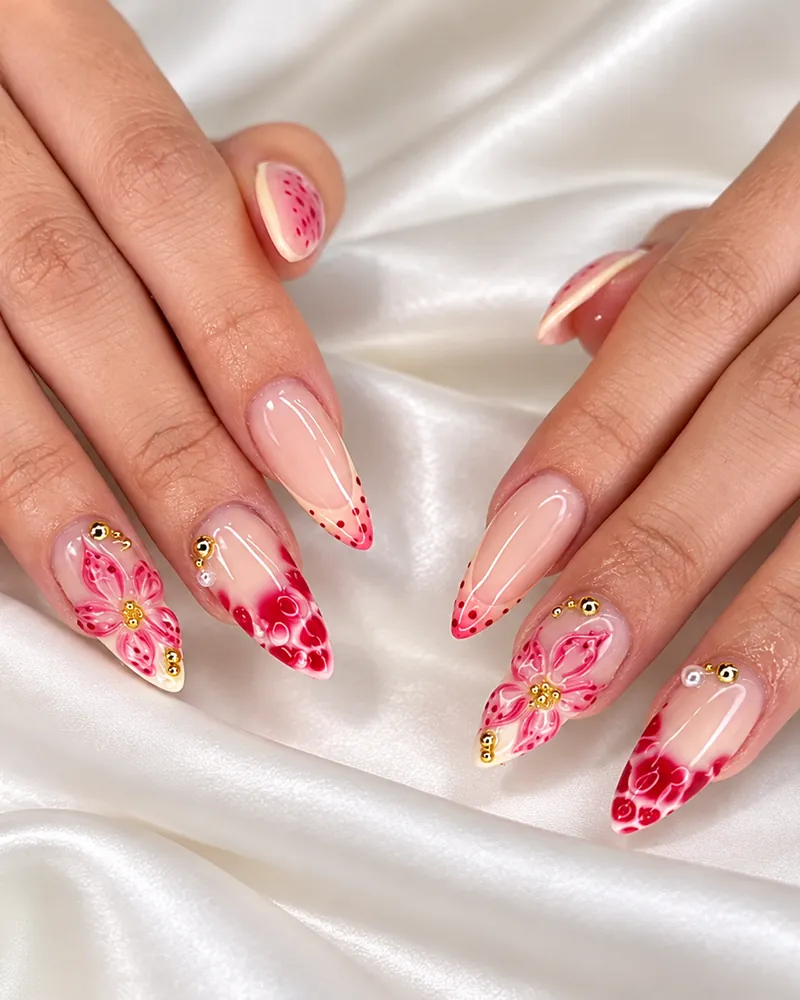 Pink French almond nails with hand-painted flowers and gold beads at Chillux Nails, Orpington