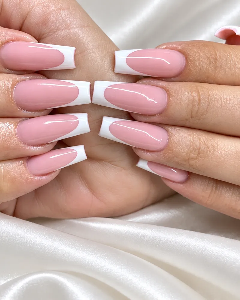 Long coffin nails with deep white French tips at Chillux Nails, Orpington